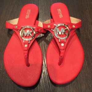 Bright orange Michael Kors sandals
